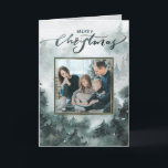 Floral Winter | Watercolor Photo Christmas Card<br><div class="desc">Your family photo is front and centre in a forest green frame with a faux gold overlay. The background on this Christmas card features a majestic watercolor forest of evergreen trees. The top of the card has a watercolor greeting that says "Merry Christmas." On the inside the greeting reads "May...</div>