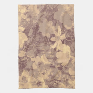 Flower and leaf camouflage pattern on beige tea towel