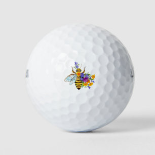Flower bee with wild plants golf balls
