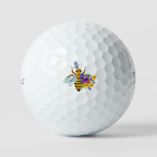 Flower bee with wild plants golf balls