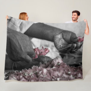 Flower in Hands Fleece Blanket