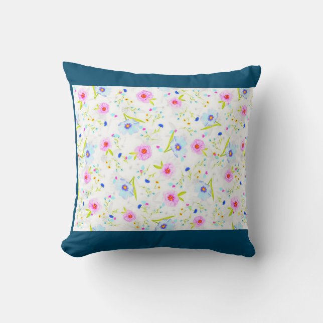 FLOWERED throw pillow in blue. (Front)