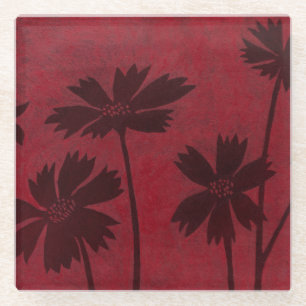 Flowerhead Silhouettes on Crimson Background Glass Coaster