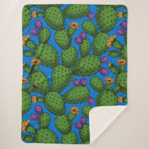 Flowering opuntia on blue sherpa blanket