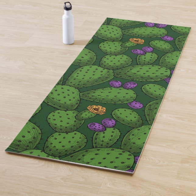 Flowering opuntia on dark green yoga mat (In Situ)