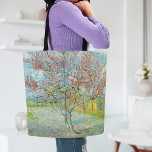 Flowering Peach Tree | Vincent van Gogh Tote Bag<br><div class="desc">Flowering Peach Tree (1888) by Dutch post-impressionist artist Vincent van Gogh. Original artwork is an oil on canvas depicting a beautiful landscape of blossoming pink trees.

Use the design tools to add custom text or personalise the image.</div>