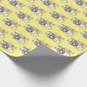 Flowers and Camera on Yellow Wrapping Paper