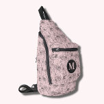 Flowers and Faces Monogrammed Pink Sling Bag<br><div class="desc">This stylish sling bag features an all-over hand drawn pattern of faces and flowers and your monogram initial on the front. Three zippered compartments can easily store your keys, wallet, phone, camera, and plenty more. Wear it as a crossbody or over one shoulder, and attach the adjustable strap to a...</div>