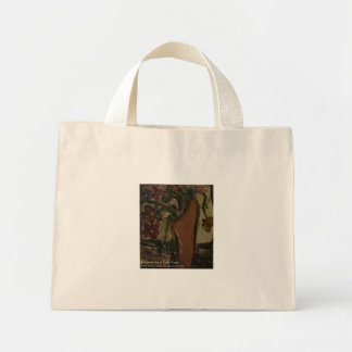 flowers in a tan vase mini tote bag