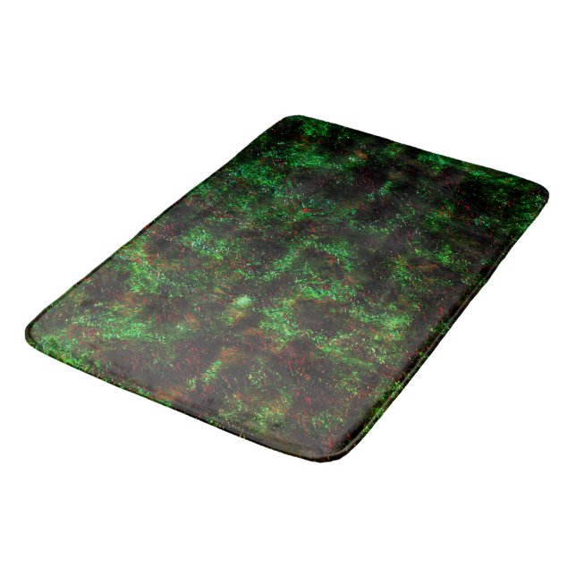 Fluctuation of dark spots on showy green and red bath mat (Angled)
