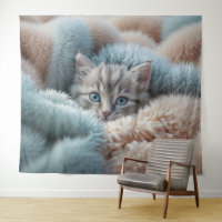 Fluffy Kitten in a Soft Blanket