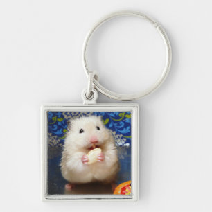 Fluffy syrian hamster Kokolinka eating a seed Key Ring