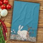 Fluffy White Bunny Sitting in Flowers on Dark Blue Tea Towel<br><div class="desc">This kitchen hand towel has a fluffy white bunny rabbit sitting on a grey ground in between orange and white flowers on a dark blue background.</div>