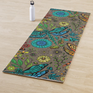 Fly, fly dragonfly on brown yoga mat