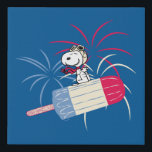Flying Ace Snoopy on Ice Pop Faux Canvas Print<br><div class="desc">Peanuts 4th of July | Check out Flying Ace Snoopy on a red,  white,  and blue ice pop,  riding past fireworks in the sky!</div>