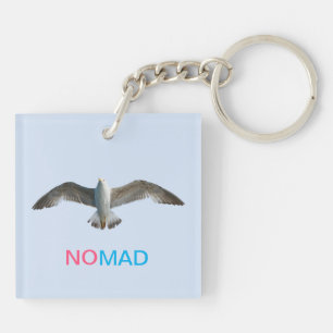 Flying bird and calligraphy on light blue key ring