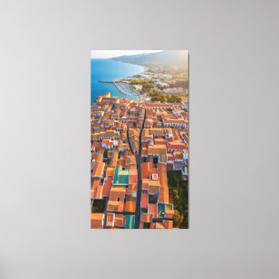 Flying over the rooftops of the town canvas print