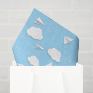 flying paper aeroplanes puffy clouds blue sky