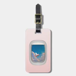 flying pig through aeroplane window luggage tags