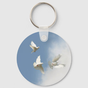 Flying white doves keychain