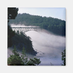 Fog drifts under the Deception Pass bridge at Magnet
