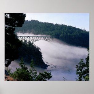 Fog drifts under the Deception Pass bridge at Poster