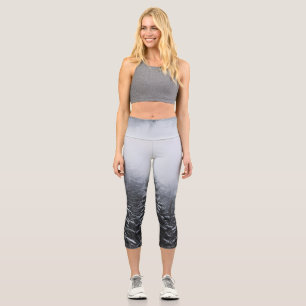 Fog over snow covered spruce forest in winter capri leggings