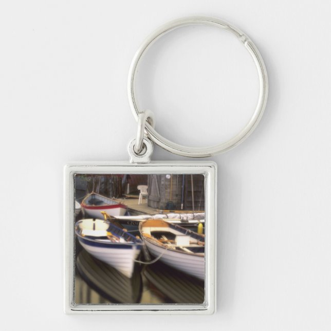 Fog surrounds four boats docked. key ring (Front)