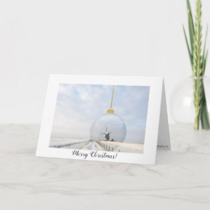 Folded christmas card with glass ball and windmill