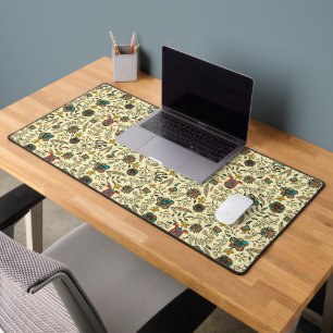 Folk art pattern on pale yellow background desk mat