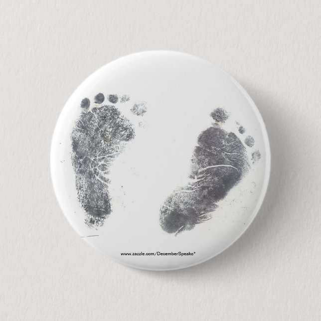 Foot prints 6 cm round badge (Front)