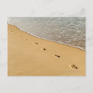 Foot prints in Sand with Wave Postcard