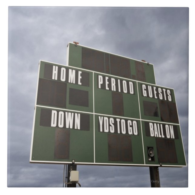 Football scoreboard and storm clouds. tile (Front)