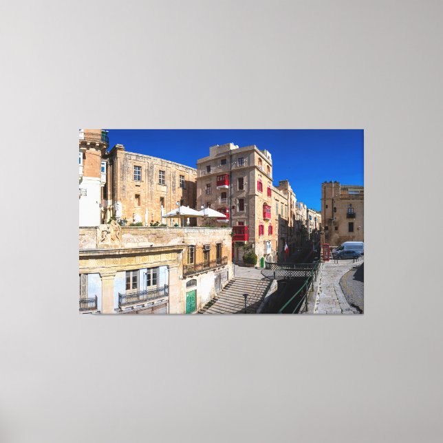 Footbridge, narrow street with stairs in Valletta Canvas Print (Front)
