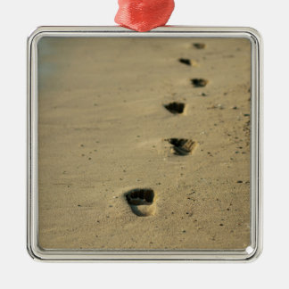 Footprints alongside the sea metal tree decoration
