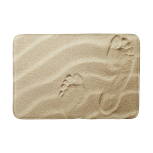 Footprints In The Sand Waves As Background Bath Mat