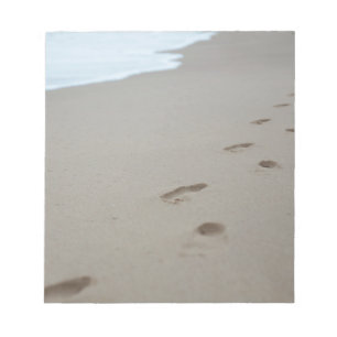 Footprints on a white beach in Mozambique Notepad