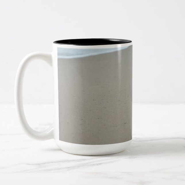 Footprints on a white beach in Mozambique Two-Tone Coffee Mug (Left)