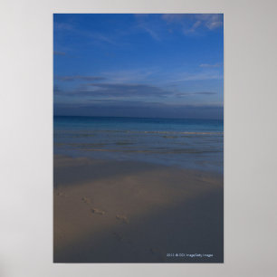 Footprints on beach poster