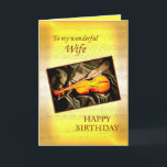 For wife, a musical birthday card with a violin<br><div class="desc">A musical card featuring a violin lying on silk. In the background is a page of sheet music. See the whole range of cards for ages and relationships in my store. All artwork copyright Norma Cornes</div>