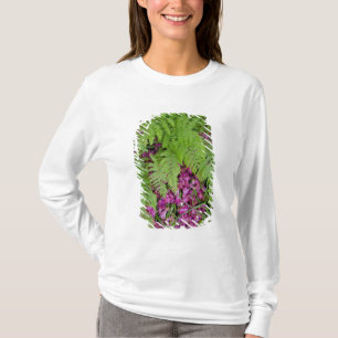 Forest ferns with pink flower petals on ground T-Shirt
