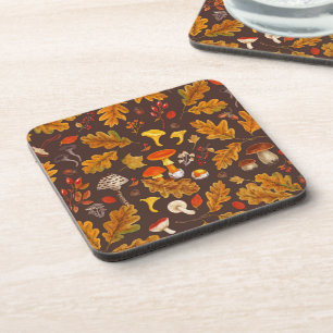 Forest mushrooms and autumn flora on brown coaster