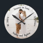 Forever in Love Wedding Anniversary Photo Round Clock<br><div class="desc">Keep your significant other close with this photo anniversary keepsake with photo,  sentiment,  name,  marriage and number of years married.  Composite design by Holiday Hearts Designs.</div>