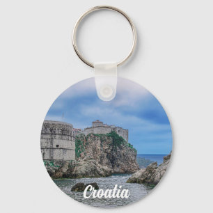 Fortress walls, rocky coast and sea in Croatia Key Ring