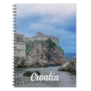 Fortress walls, rocky coast and sea in Croatia Notebook
