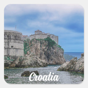 Fortress walls, rocky coast and sea in Croatia Square Sticker