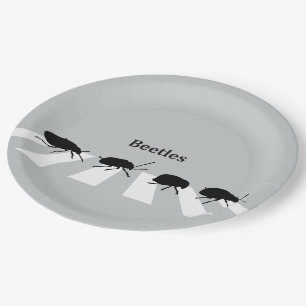 Four beetles walking across a crosswalk in London… Paper Plate