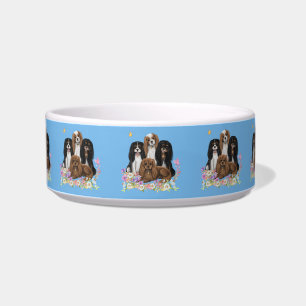 Four Cavalier King Charles Spaniels in Flowers Bowl