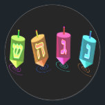 Four Dreidels Stickers<br><div class="desc">Four multicolored dreidels showing nun, gimel, hei, and shin. Nes Gadol Hayah Sham. A Chanukah design.</div>