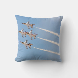 Four F-16 Thunderbirds fly in close formation Cushion